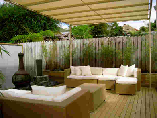 Retractable Awnings - Sunwise over outdoor furniture copy.jpg
