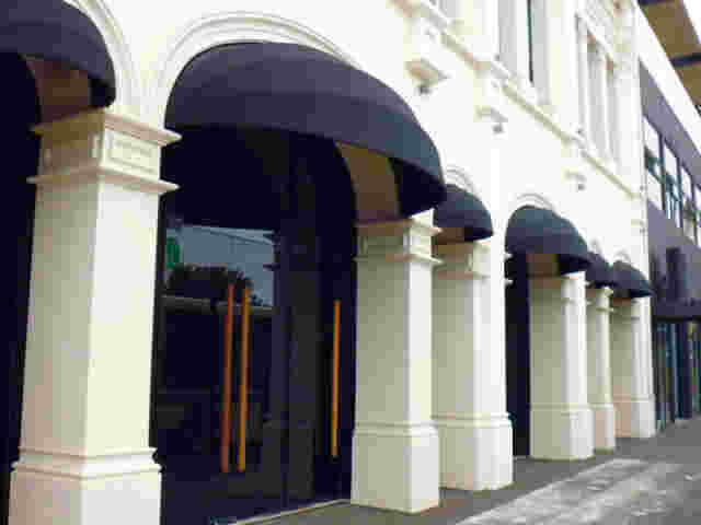 Fixed Frame Awnings - Black Canvas Fixed Frame awnings over entrance (1) copy.jpg