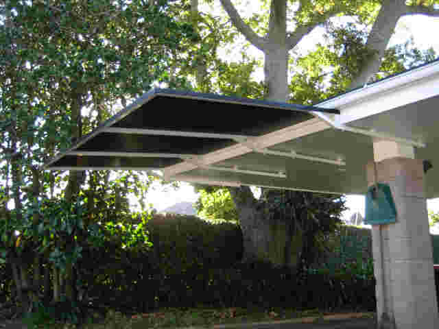 Fixed Frame Awnings - Cantilevered angled Fixed Frame awning off carport in Remuera copy.jpg