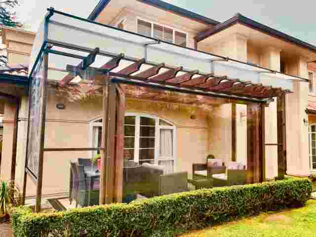 Fixed Frame Awnings - Curved Patio canopy on top of wooden pergola in St Heliers 2 copy.jpg