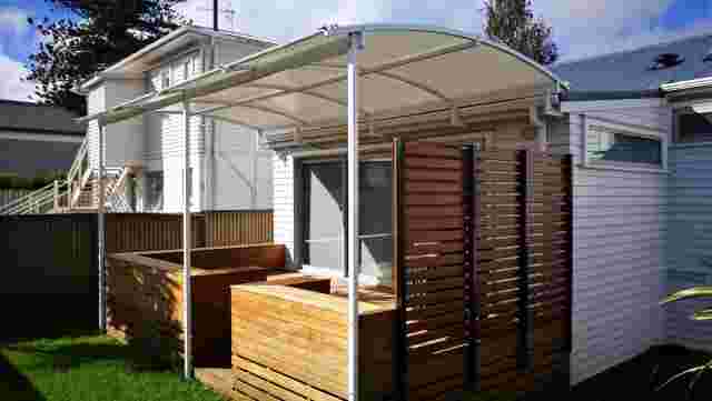 Fixed Frame Awnings - Curved Patio room AFTER in Ellerslie 1 copy.jpg
