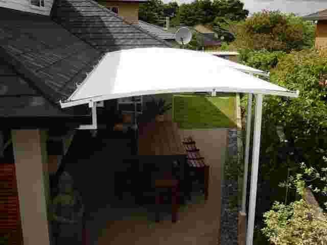 Fixed Frame Awnings - Curved Patio room in The Gardens copy.jpg