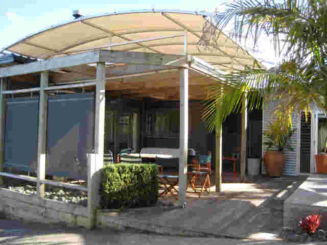Fixed Frame Awnings - Curved Patio room on timber pergola in Auckland copy.jpg