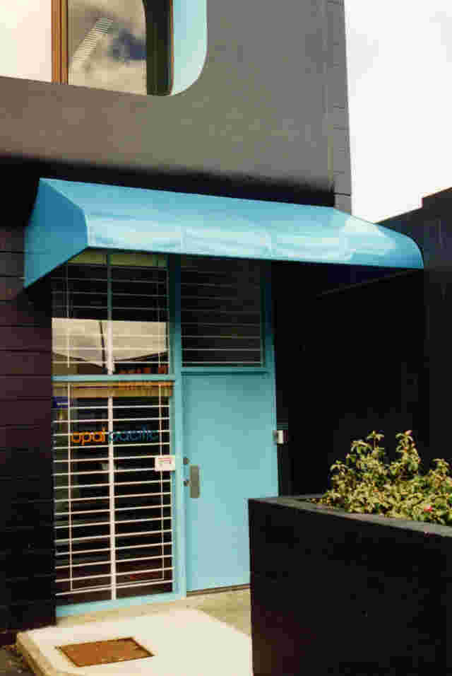 Fixed Frame Awnings - Fixed Frame wedge awning with curved front over office entrance in Auckland 1 copy.jpg