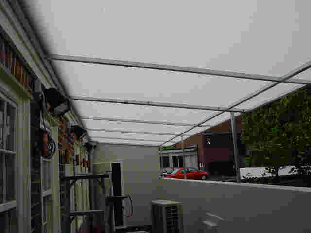 Fixed Frame Awnings - Flat Angled panel Fixed Frame awning over rear courtyard in Parnell copy.jpg