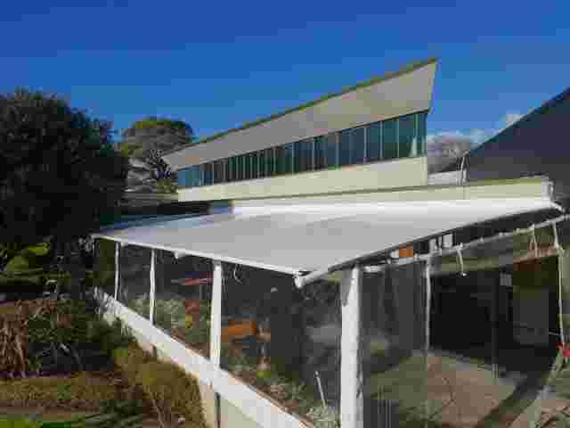Fixed Frame Awnings - Tensioned PVC roof with hand-rolled blinds copy.jpg