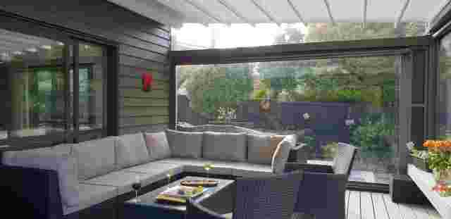 Retractable Roof - Oztech retractable roof with furniture setting in Meadowbank copy.jpg