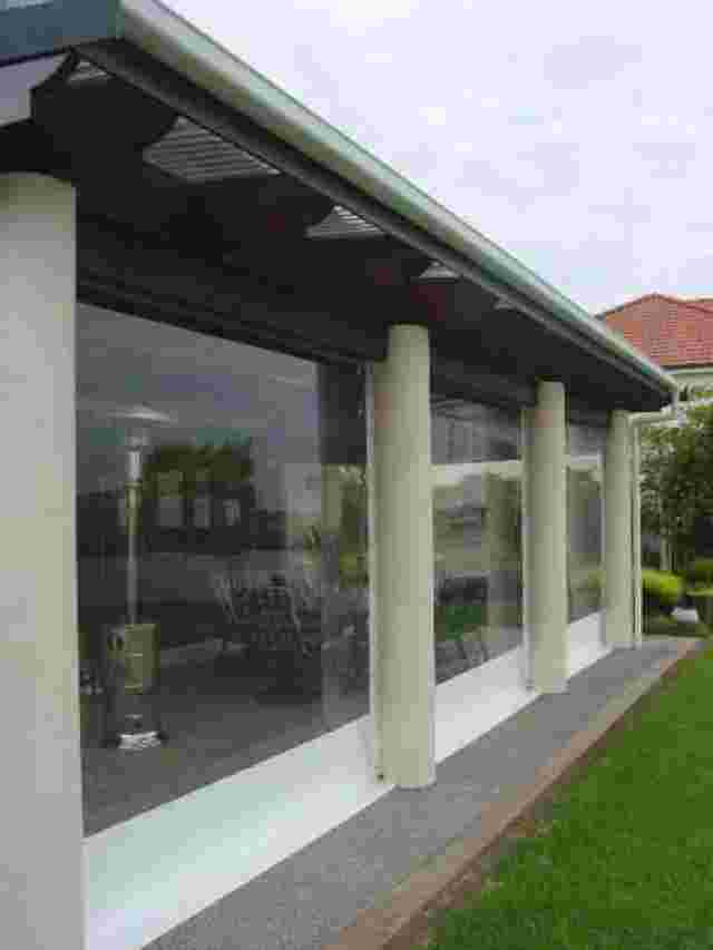 Patio Screens - retractable_awning_house_2 copy.jpg