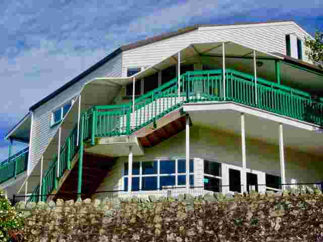 Fixed Frame Awnings - Angled panel fixed frame awning over stairwell in Greenlane1 copy.jpg