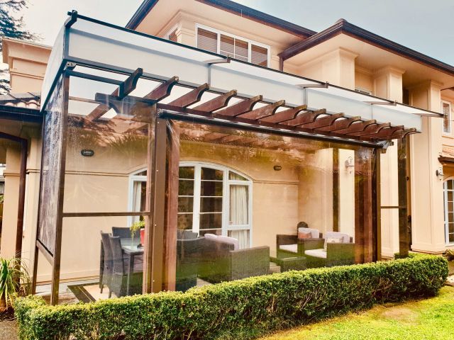 Fixed Frame Awnings - Curved Patio canopy on top of wooden pergola in St Heliers 2 copy.jpg