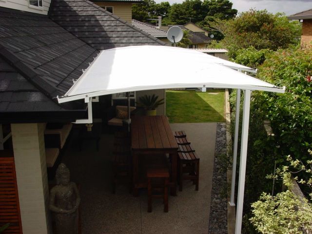 Fixed Frame Awnings - Curved Patio room in The Gardens copy.jpg