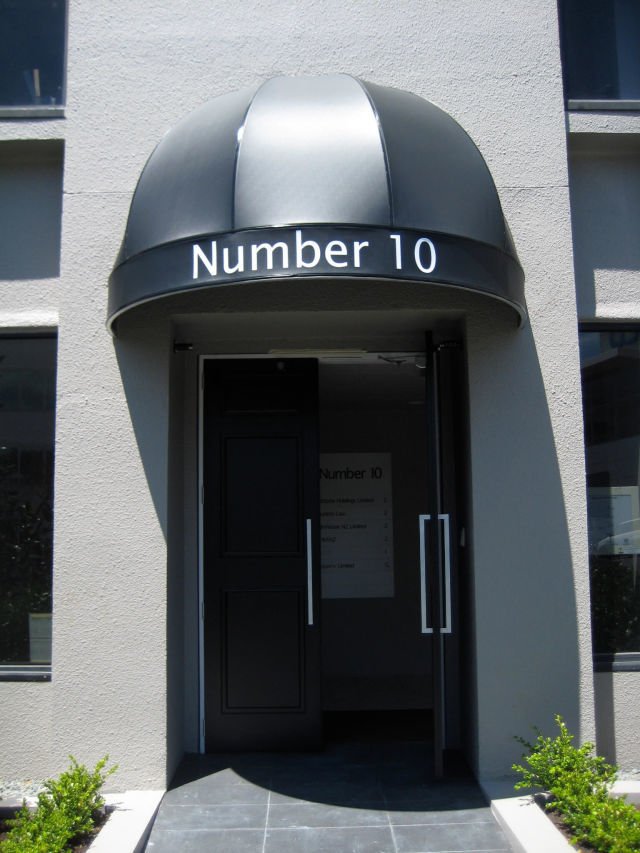 Fixed Frame Awnings - Fixed Frame umbrella style awning over office entrance copy.jpg