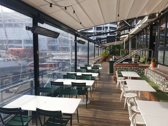Patio Screens - Ziptrak screens on retractable roof structure at Princes Wharf copy.jpg